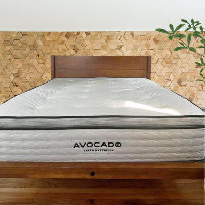 testing the Avocado Green mattress on a bed frame