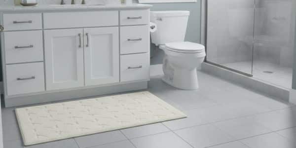 Testing the Coyuchi diamond rug in the bathroom