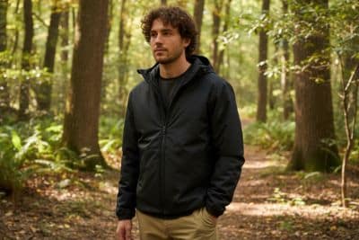 Our tester models the Quince Hybrid Insulated Lightweight Hooded Jacket